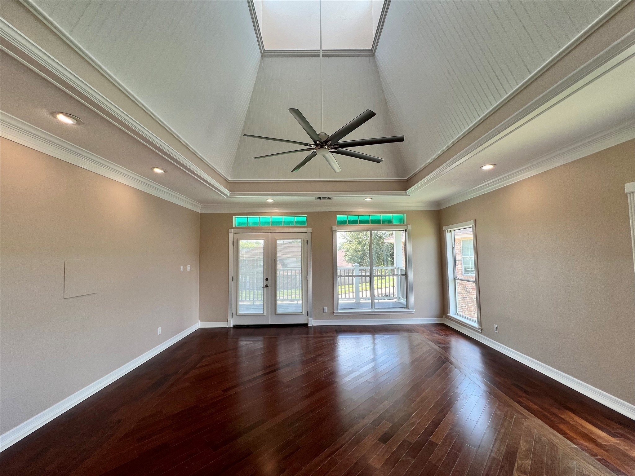 341 Lasso Street Angleton, TX 77515 - Photo 37 of 49 a view of room with wooden floor and a ceiling fan