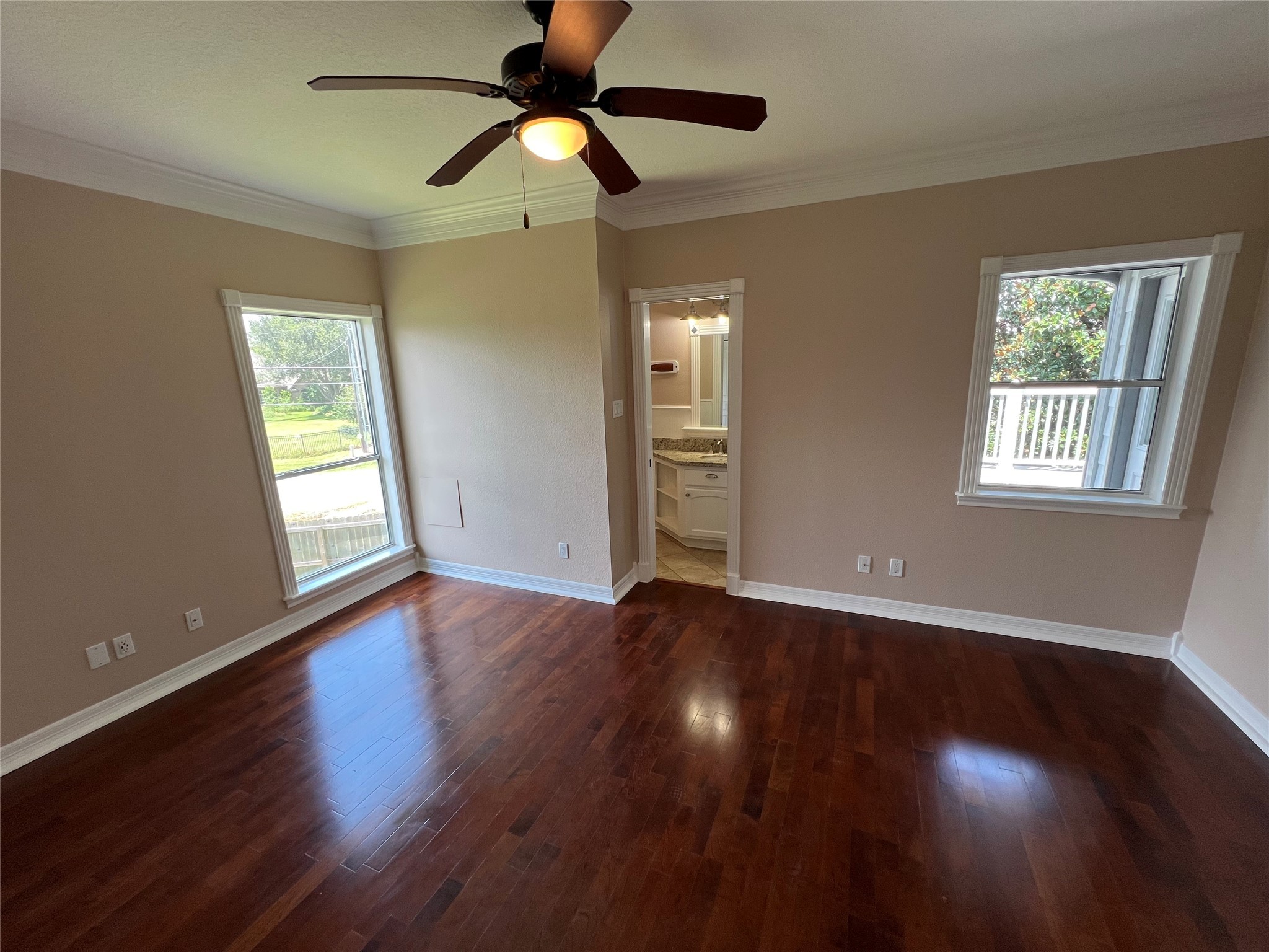 341 Lasso Street Angleton, TX 77515 - Photo 40 of 49 a view of an empty room with wooden floor and a window