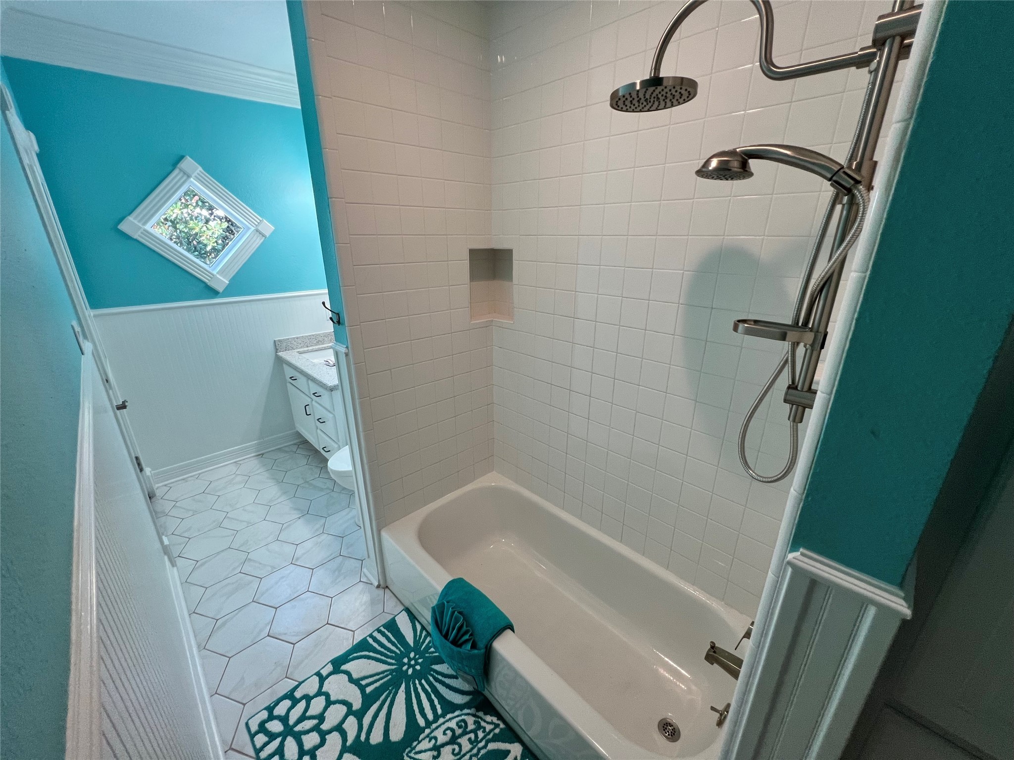 341 Lasso Street Angleton, TX 77515 - Photo 45 of 49 a bathroom with a granite countertop shower and a toilet