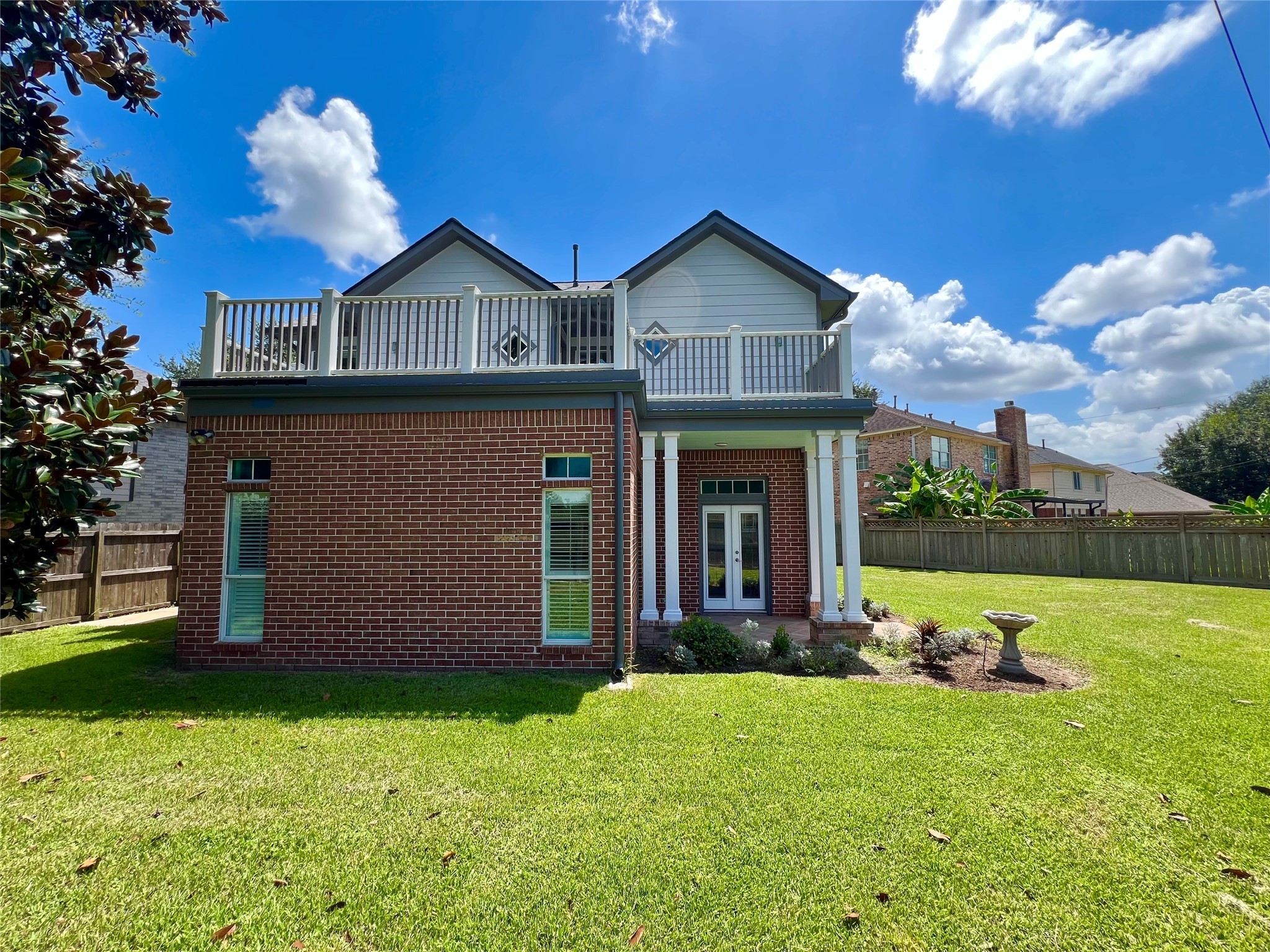 341 Lasso Street Angleton, TX 77515 - Photo 49 of 49 a view of a house with a yard
