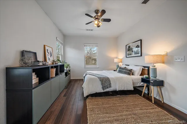 a bed room with bed and window