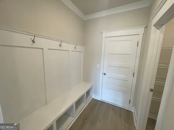 a bathroom with a toilet and a bathtub