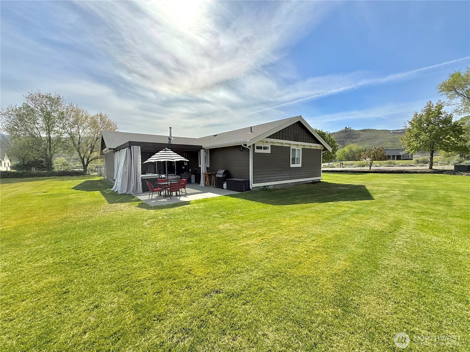 4 River Overlook Omak, WA 98841 - Photo 3 of 40 a view of a house with a big yard