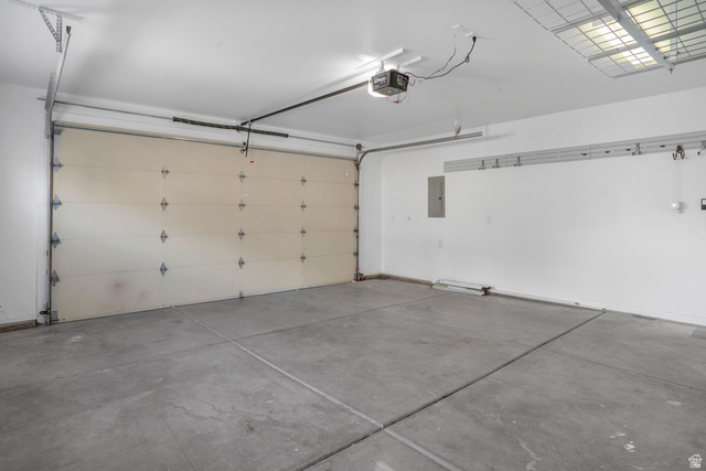 1570 South Rio Virgin Drive Washington, UT 84780 - Photo 65 of 71 Garage with electric panel and a garage door opener