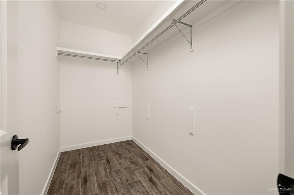 2608 Robin Road Weslaco, TX 78596 - Photo 13 of 14 a view of a room with wooden floor