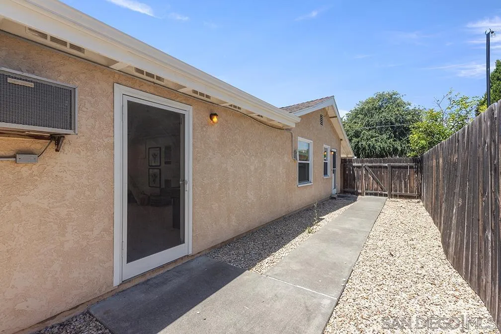 13811 Tobiasson Road Poway, CA 92064 - Photo 16 of 49 a view of a house with a backyard