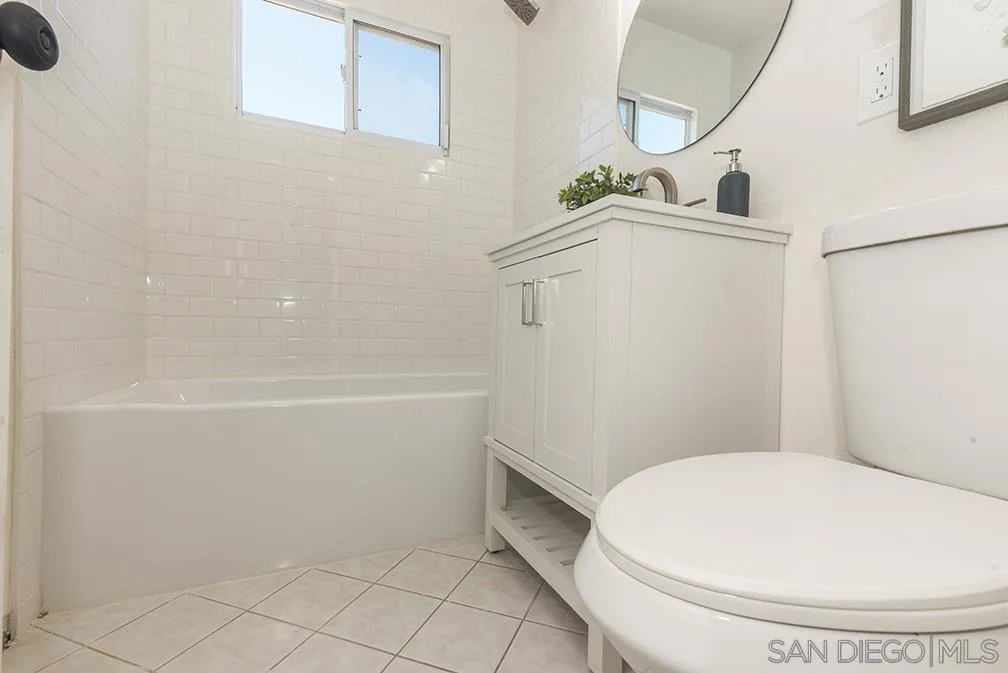 13811 Tobiasson Road Poway, CA 92064 - Photo 21 of 49 a bathroom with a sink and toilet