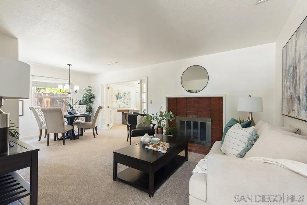 13811 Tobiasson Road Poway, CA 92064 - Photo 24 of 49 a living room with furniture fireplace and window