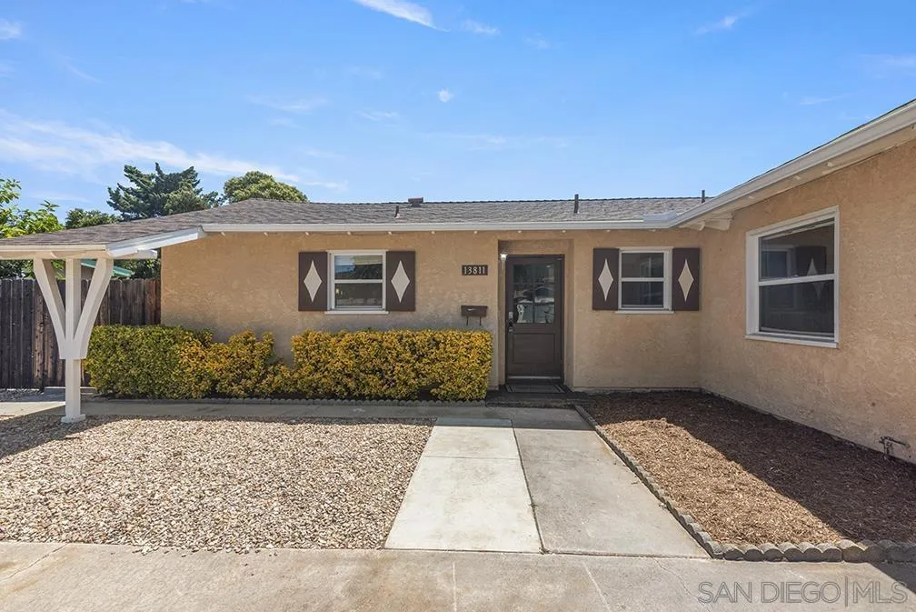 13811 Tobiasson Road Poway, CA 92064 - Photo 3 of 49 front view of a house with a yard