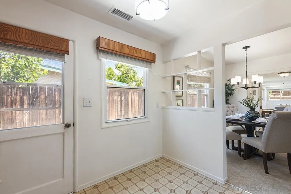 13811 Tobiasson Road Poway, CA 92064 - Photo 32 of 49 a view of a workspace with furniture and a window