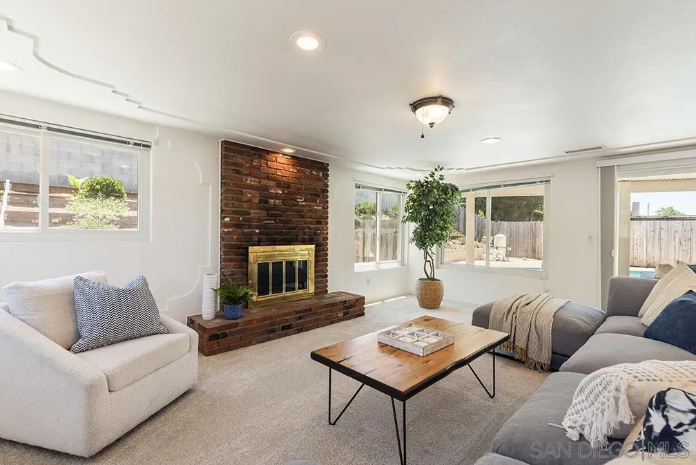 13811 Tobiasson Road Poway, CA 92064 - Photo 36 of 49 a living room with furniture and a large window