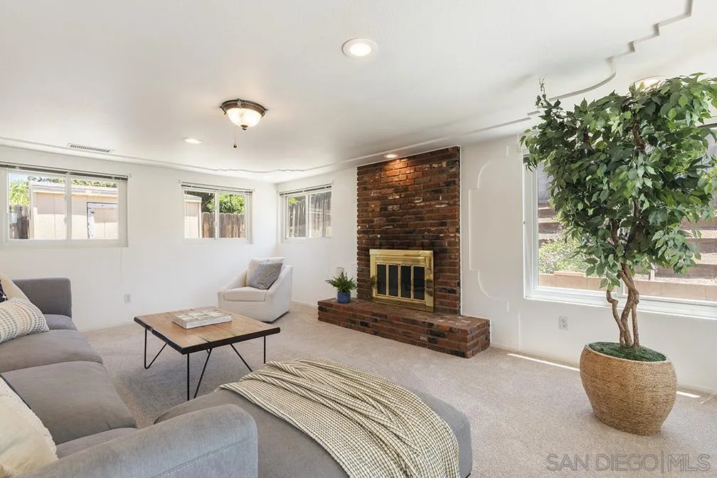 13811 Tobiasson Road Poway, CA 92064 - Photo 39 of 49 a bedroom with furniture and a potted plant