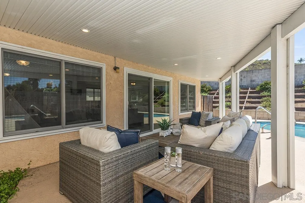 13811 Tobiasson Road Poway, CA 92064 - Photo 4 of 49 a living room with furniture and a large window