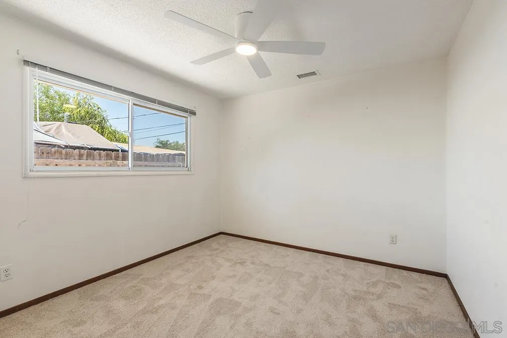 13811 Tobiasson Road Poway, CA 92064 - Photo 47 of 49 an empty room with a window