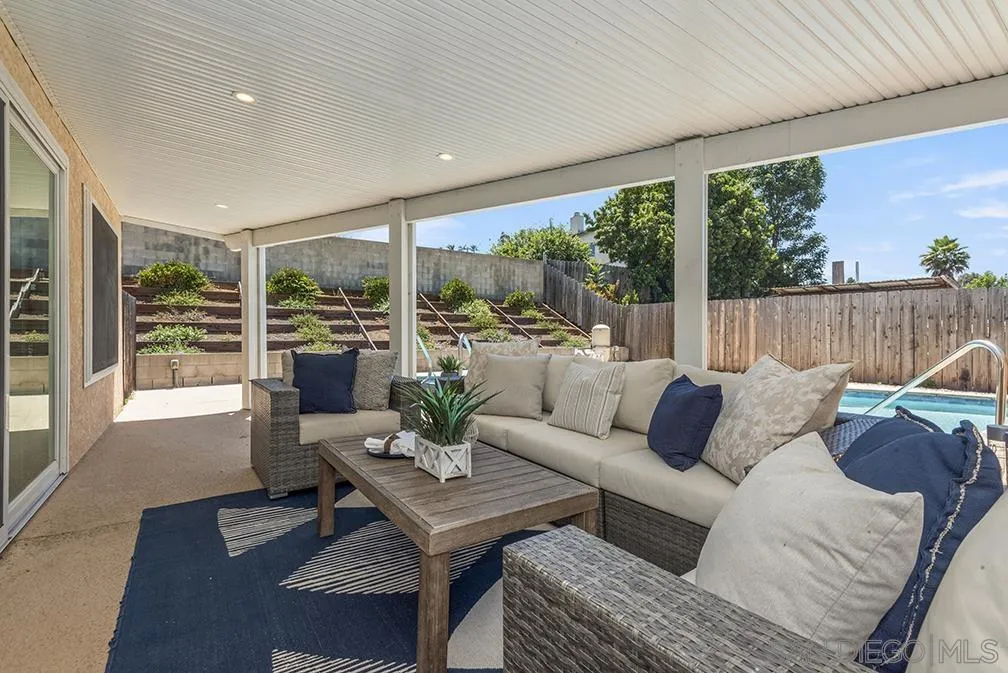 13811 Tobiasson Road Poway, CA 92064 - Photo 5 of 49 a living room with furniture and a large window