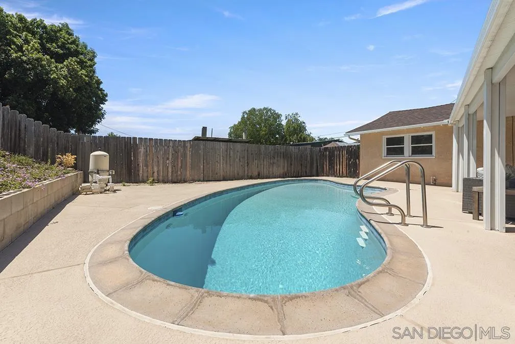 13811 Tobiasson Road Poway, CA 92064 - Photo 8 of 49 a view of a swimming pool with a patio