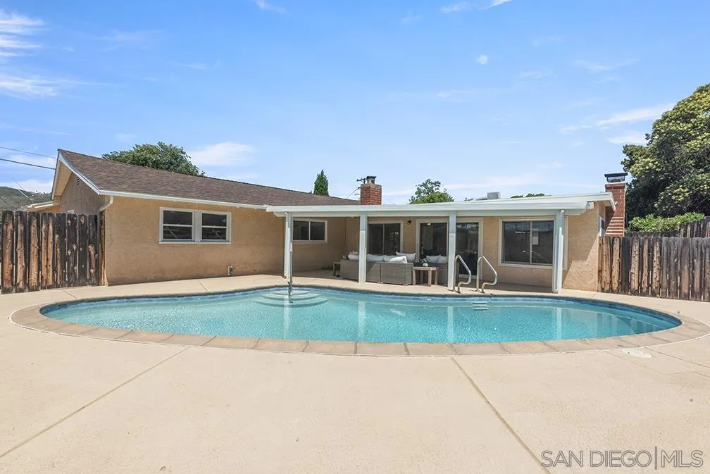 13811 Tobiasson Road Poway, CA 92064 - Photo 9 of 49 a front view of a house with a yard