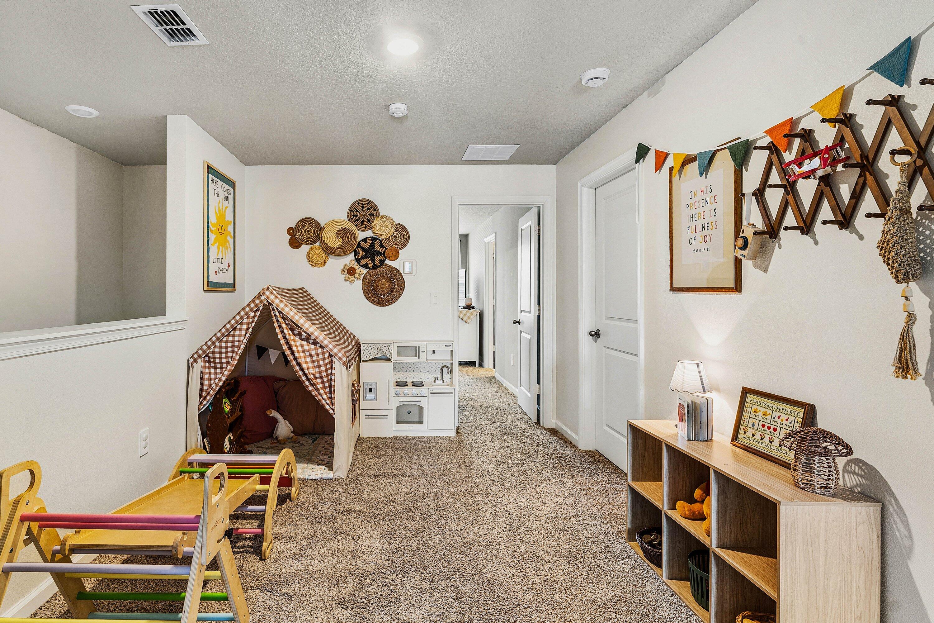5739 Southeast Edgewater Circle Stuart, FL 34997 - Photo 12 of 29 a living room with furniture and rug