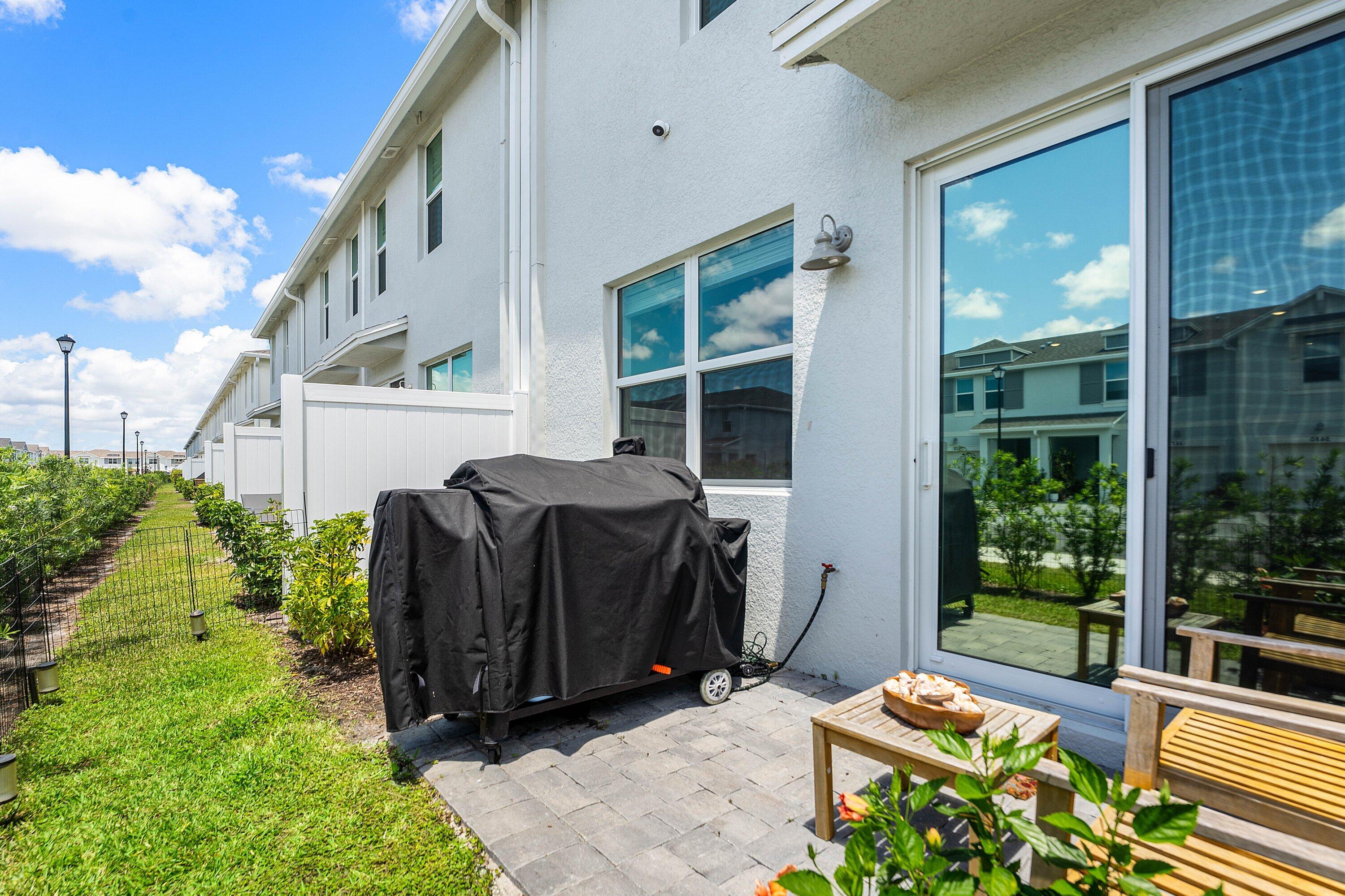 5739 Southeast Edgewater Circle Stuart, FL 34997 - Photo 23 of 29 a view of balcony with plants