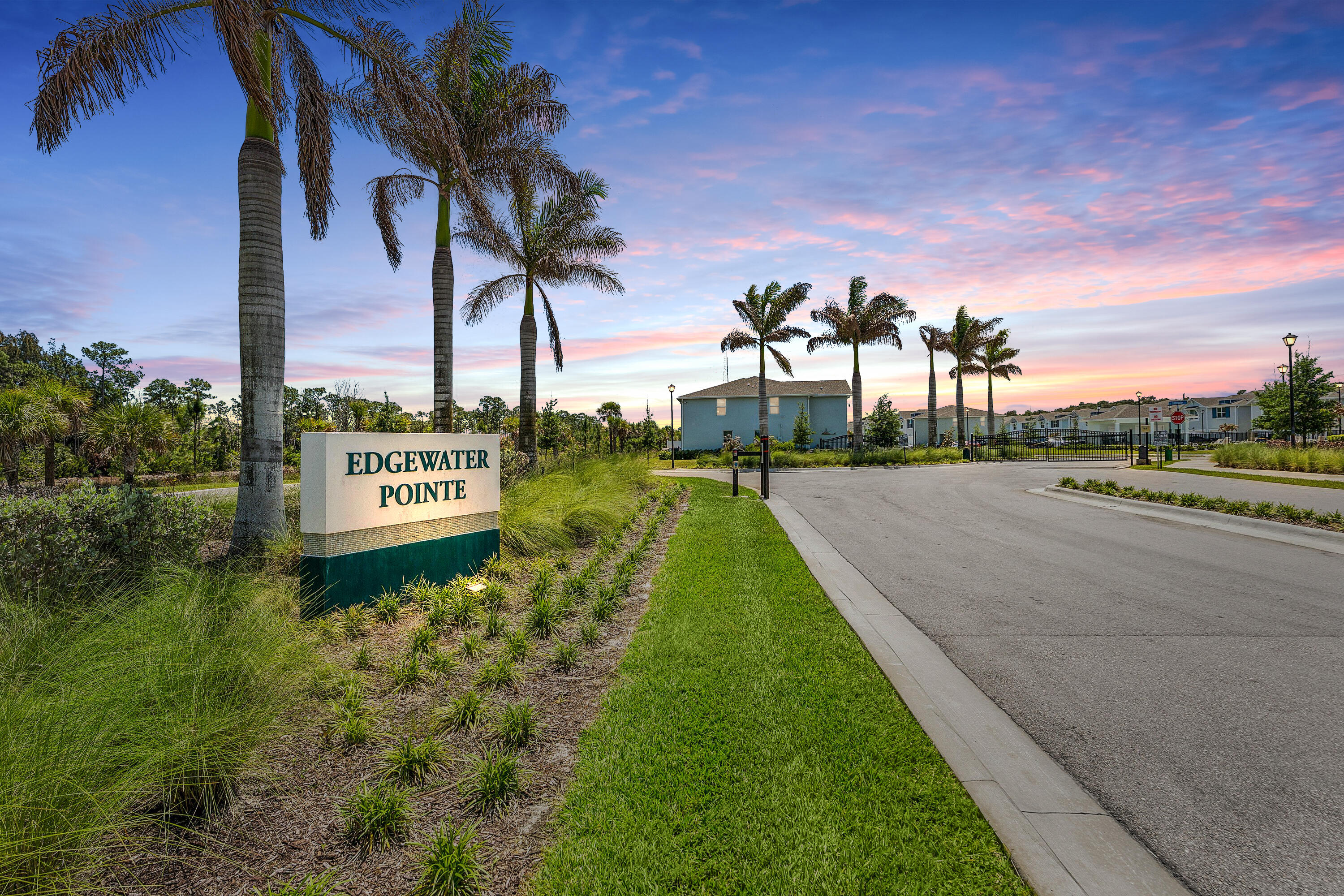 5739 Southeast Edgewater Circle Stuart, FL 34997 - Photo 27 of 29 a view of a street with a palm tree