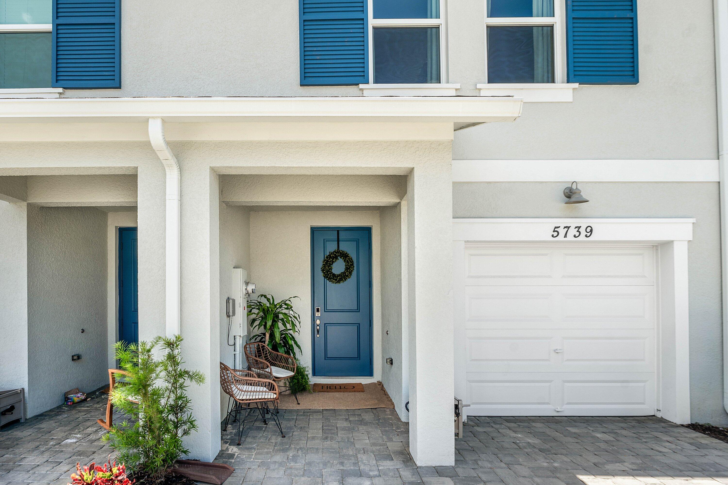 5739 Southeast Edgewater Circle Stuart, FL 34997 - Photo 3 of 29 a view of front door of house