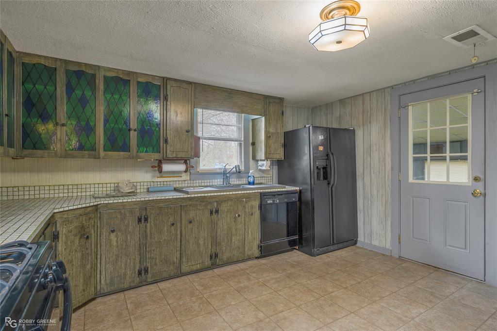 302 Princeton Road Princeton, LA 71067 - Photo 16 of 33 a bathroom with a sink and a mirror
