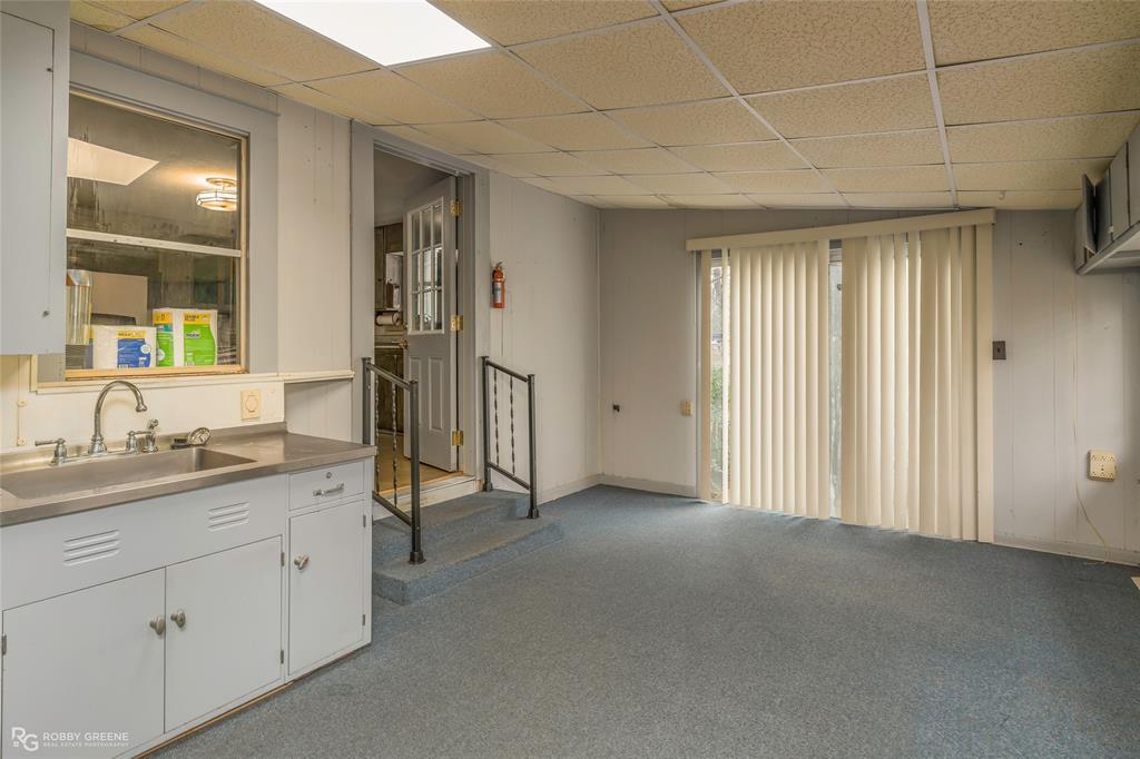 302 Princeton Road Princeton, LA 71067 - Photo 22 of 33 a view of a bathroom with a sink and mirror
