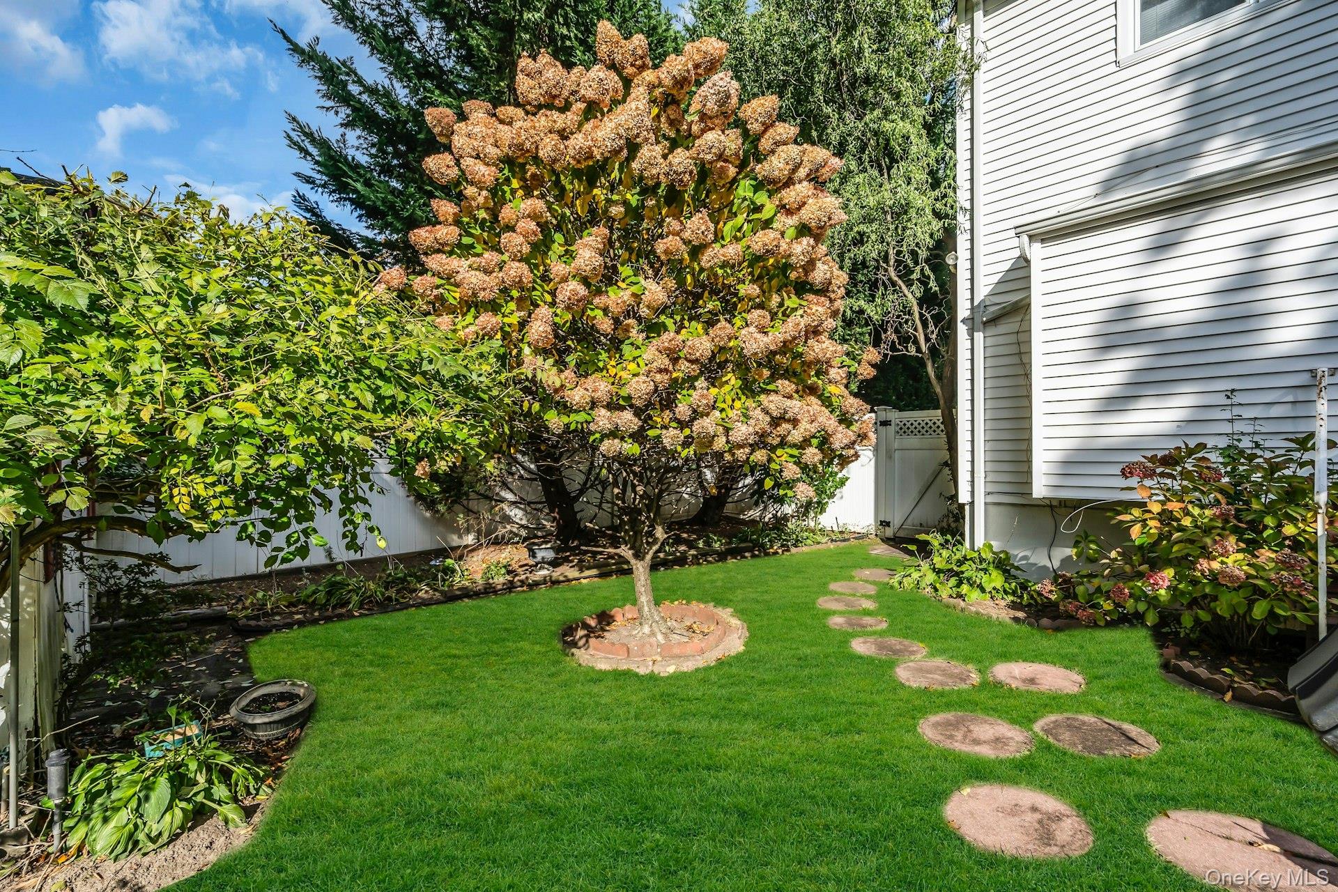 2730 Remsen Street Baldwin, NY 11510 - Photo 6 of 31 View of fenced backyard