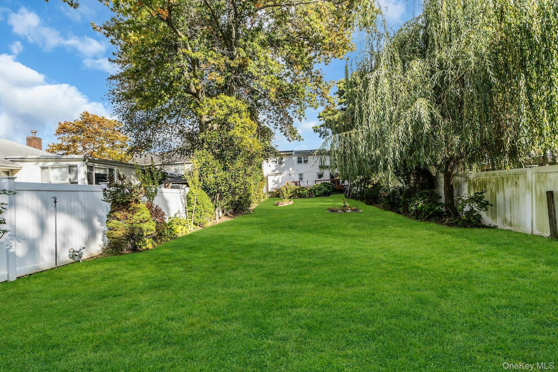 2730 Remsen Street Baldwin, NY 11510 - Photo 7 of 31 View of fenced backyard