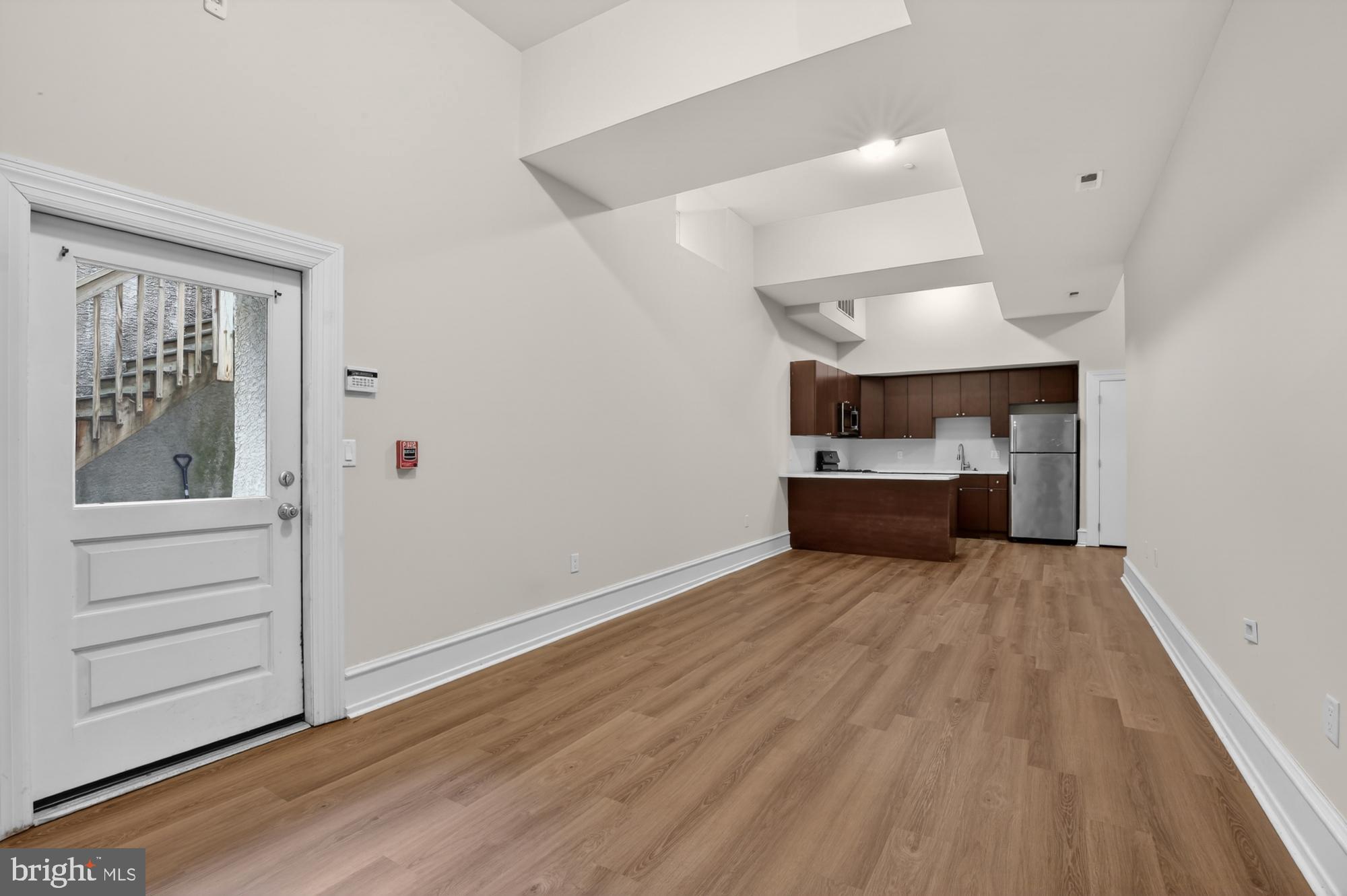 2136 East Dauphin Street, Unit 101 Philadelphia, PA 19125 - Photo 15 of 30 wooden floor in an empty room