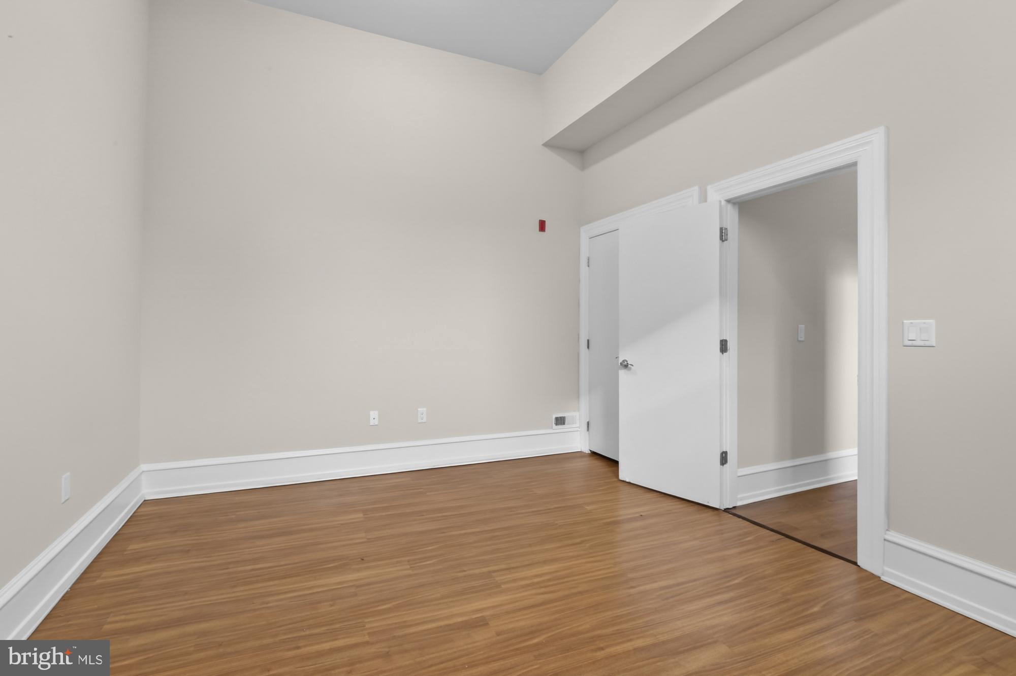 2136 East Dauphin Street, Unit 101 Philadelphia, PA 19125 - Photo 26 of 30 wooden floor in an empty room