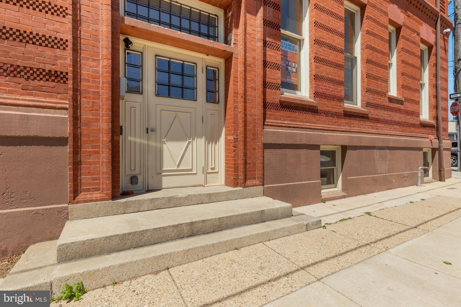 2136 East Dauphin Street, Unit 101 Philadelphia, PA 19125 - Photo 29 of 30 a building exterior with stairs
