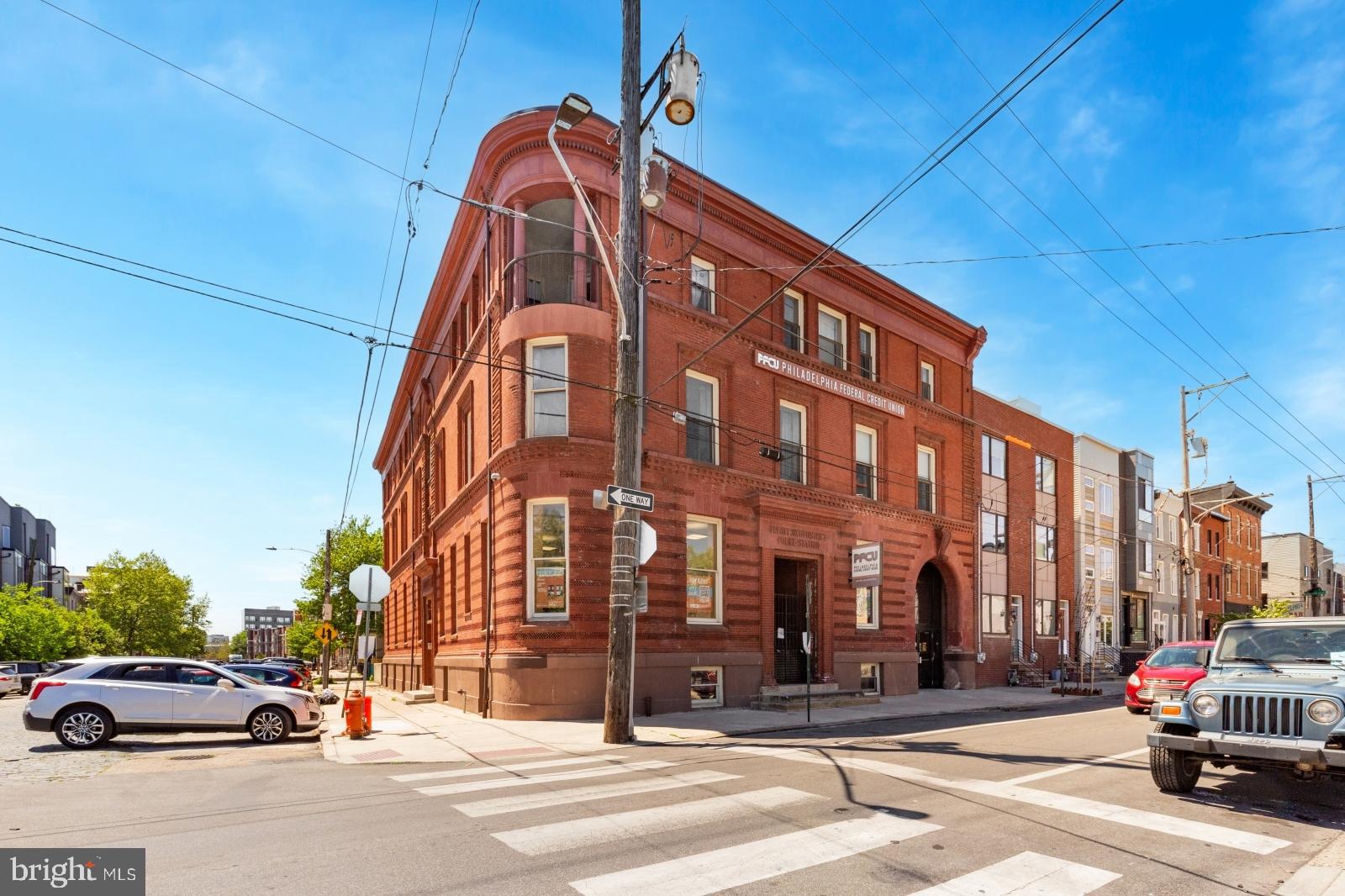 2136 East Dauphin Street, Unit 101 Philadelphia, PA 19125 - Photo 30 of 30 a cars parked in front of a building