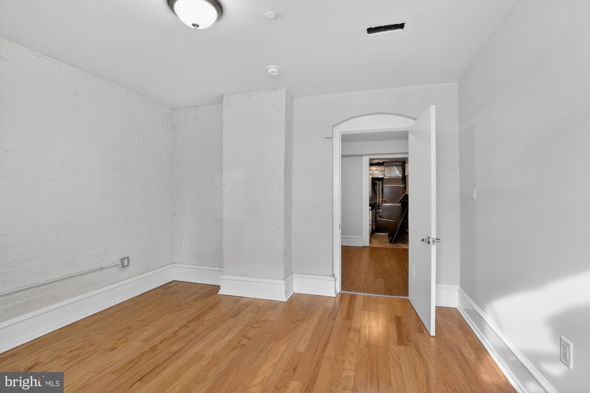 2136 East Dauphin Street, Unit 101 Philadelphia, PA 19125 - Photo 6 of 30 a view of hallway with wooden floor