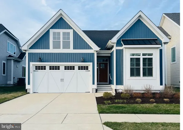 a view of a house with garage
