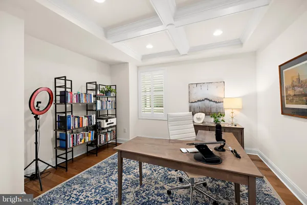 a workspace with furniture and window