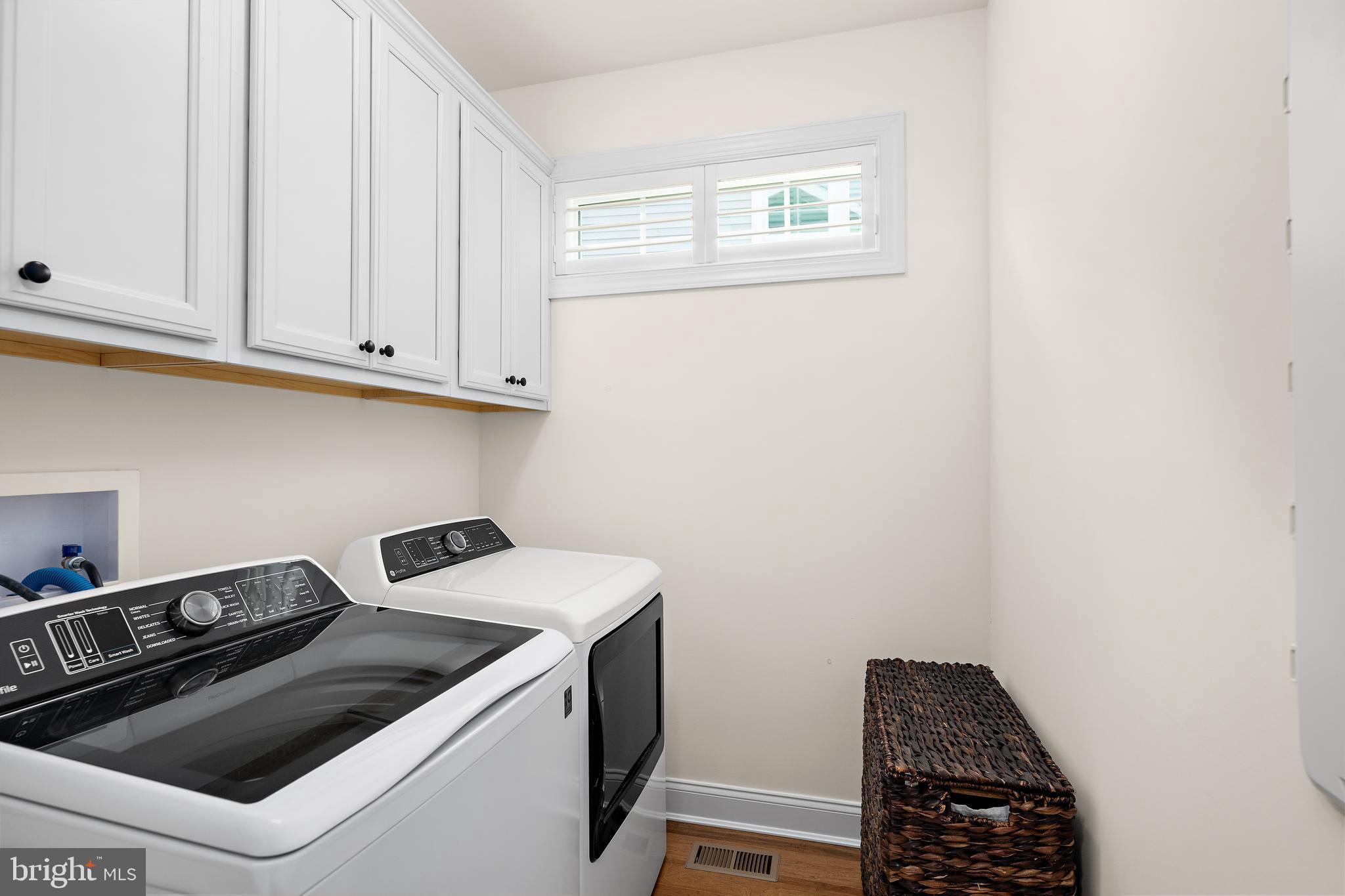11119 Marvil Road, Unit 93 Lewes, DE 19958 - Photo 32 of 52 a utility room with dryer and washer