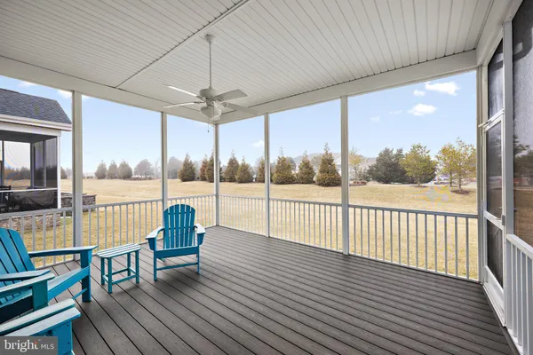 a view of balcony with furniture