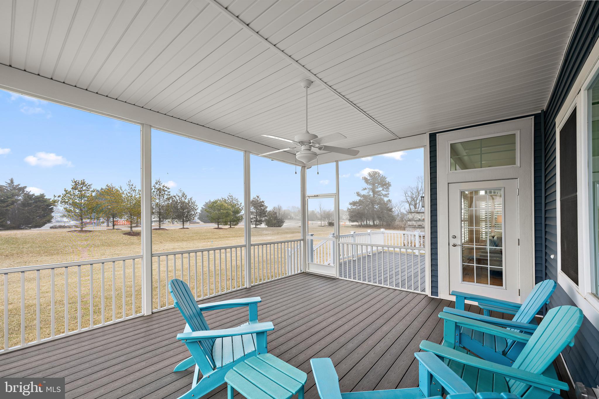 11119 Marvil Road, Unit 93 Lewes, DE 19958 - Photo 36 of 52 a view of a chairs and table in the balcony