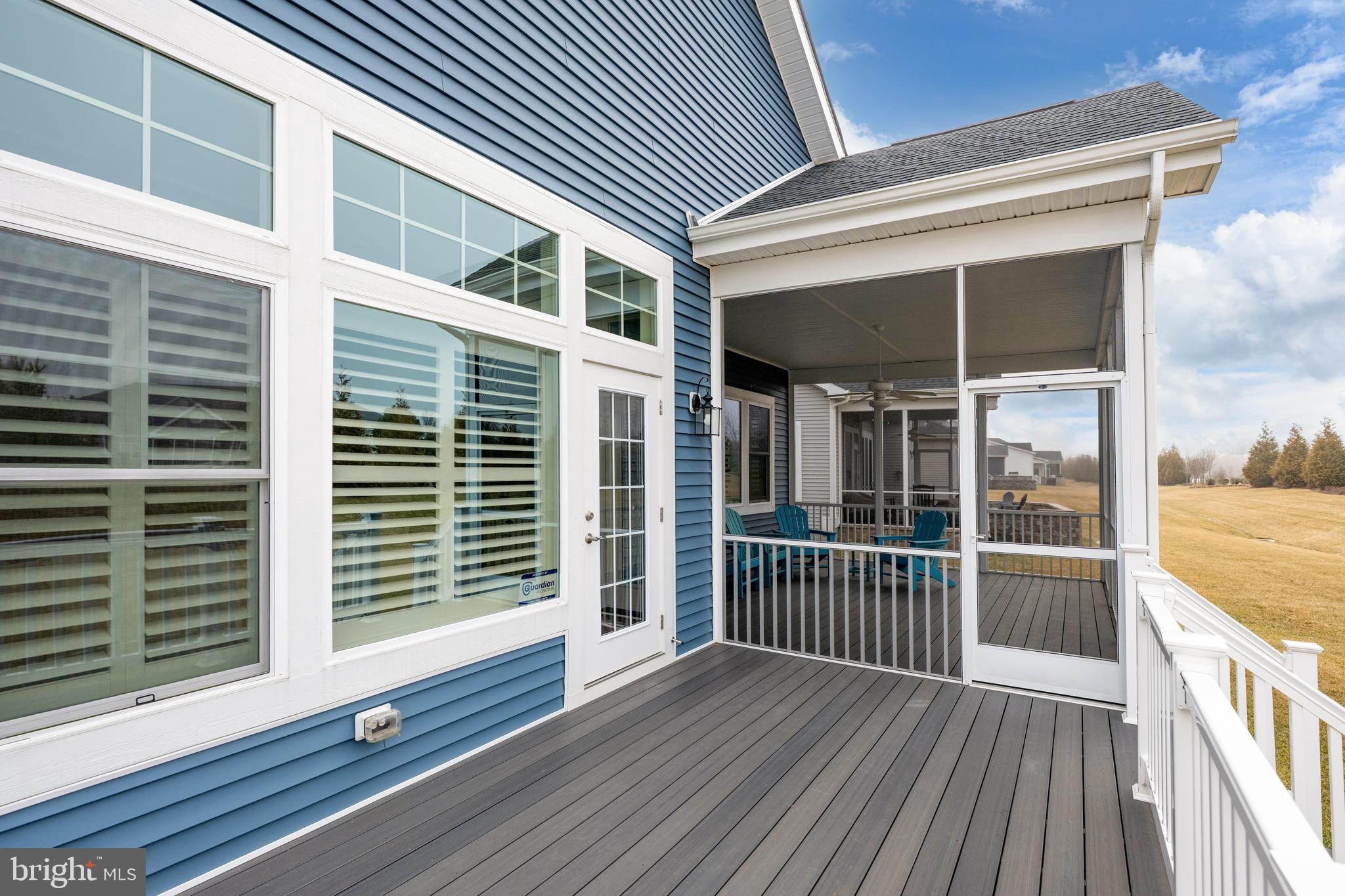 11119 Marvil Road, Unit 93 Lewes, DE 19958 - Photo 37 of 52 a view of a house with a balcony