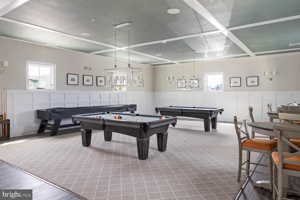 a view of a living room kitchen and dining room