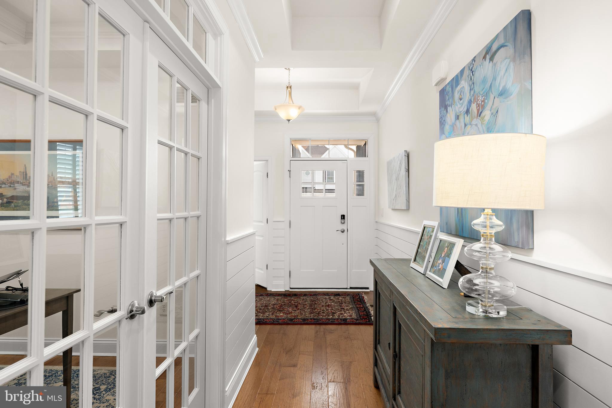 11119 Marvil Road, Unit 93 Lewes, DE 19958 - Photo 7 of 52 a living room with furniture and a rug