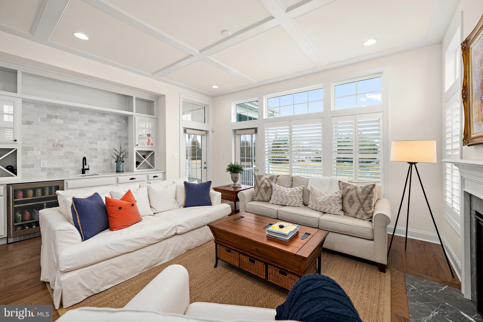 11119 Marvil Road, Unit 93 Lewes, DE 19958 - Photo 9 of 52 a living room with furniture and a large window