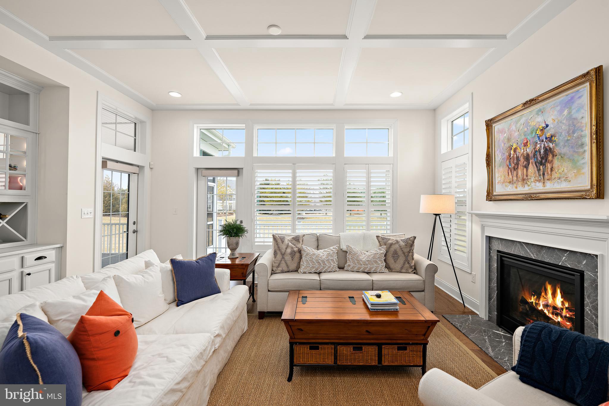 11119 Marvil Road, Unit 93 Lewes, DE 19958 - Photo 10 of 52 a living room with furniture and a fireplace