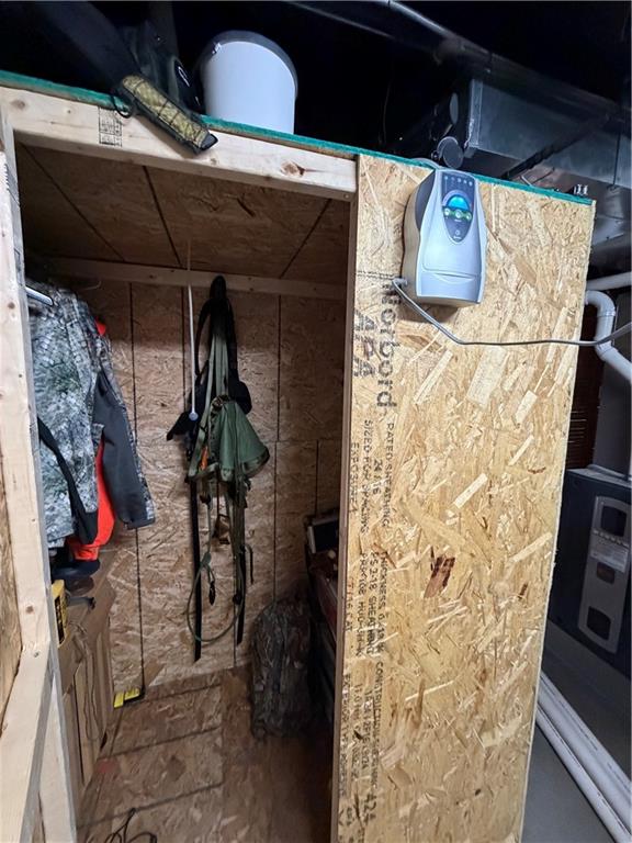 180 Hemlock Road Petrolia, PA 16050 - Photo 18 of 25 a view of walk in closet with clothes and shoes