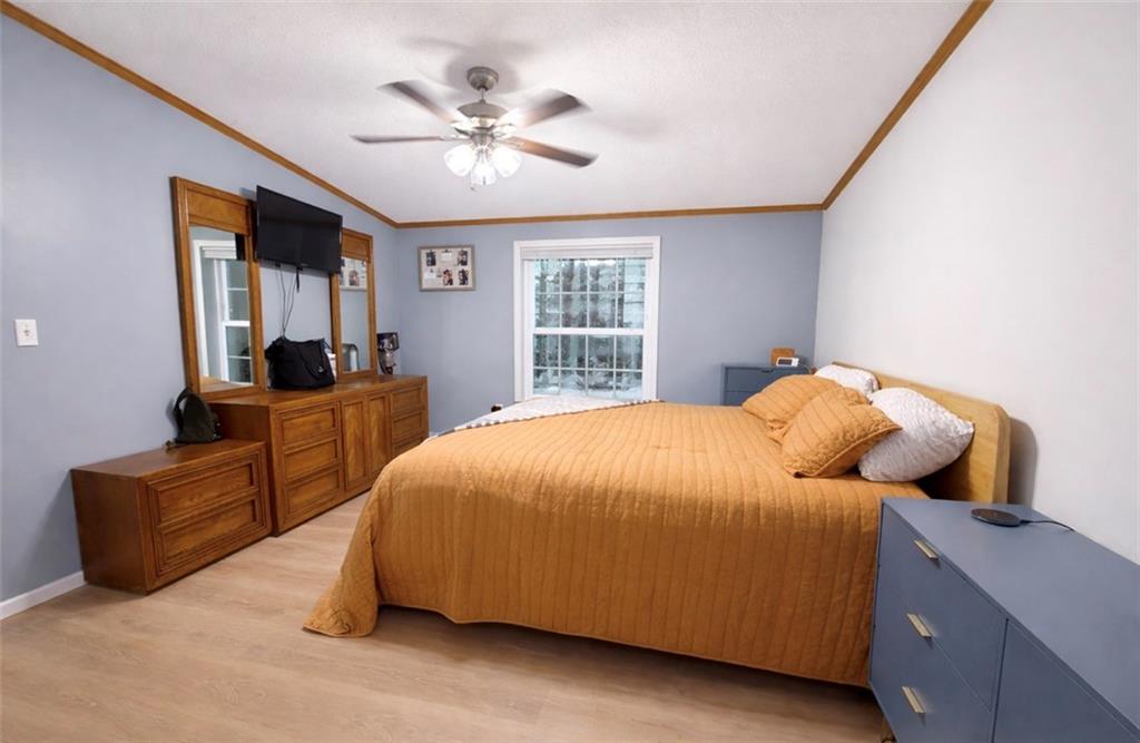 180 Hemlock Road Petrolia, PA 16050 - Photo 9 of 25 a bedroom with bed and window