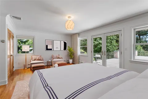 a bed room with a bed and a couch