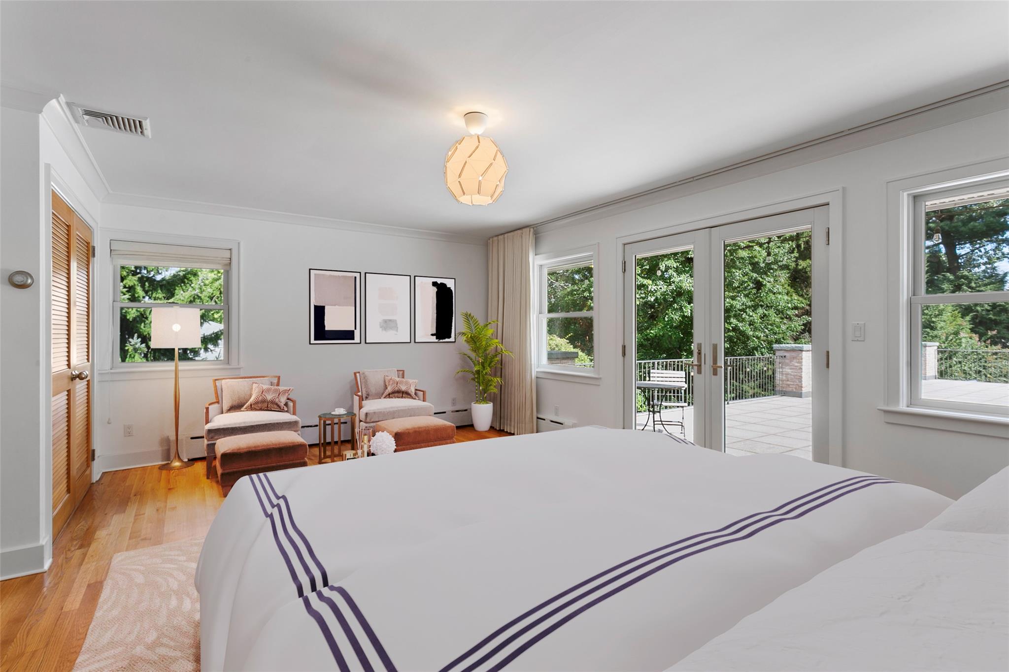 177 Clinton Avenue Dobbs Ferry, NY 10522 - Photo 13 of 29 a bed room with a bed and a couch