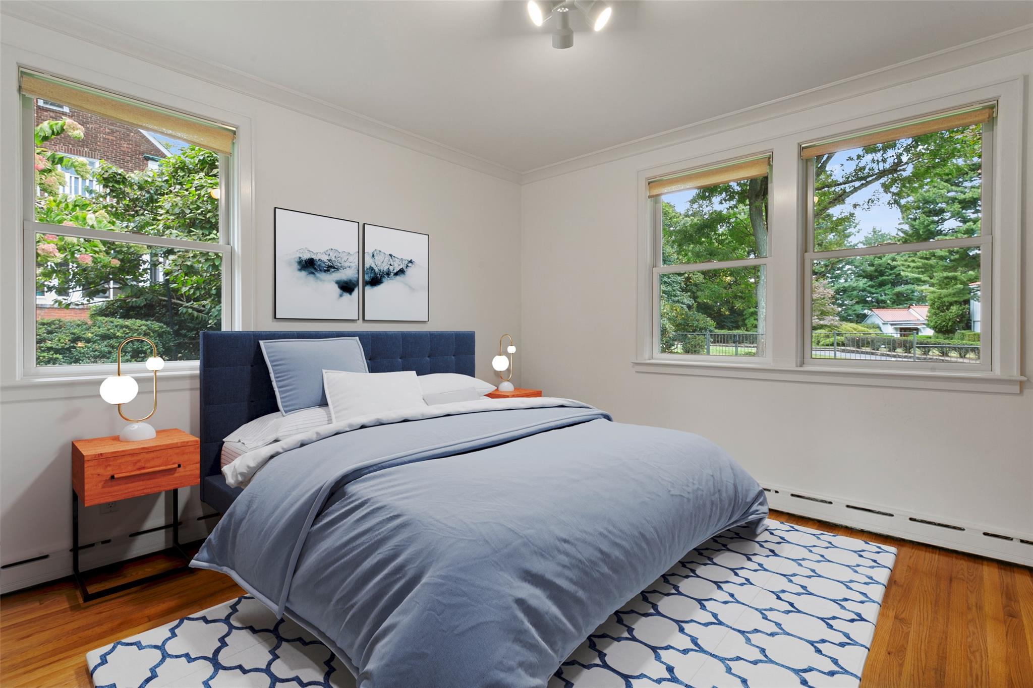 177 Clinton Avenue Dobbs Ferry, NY 10522 - Photo 16 of 29 a bedroom with a bed and a window