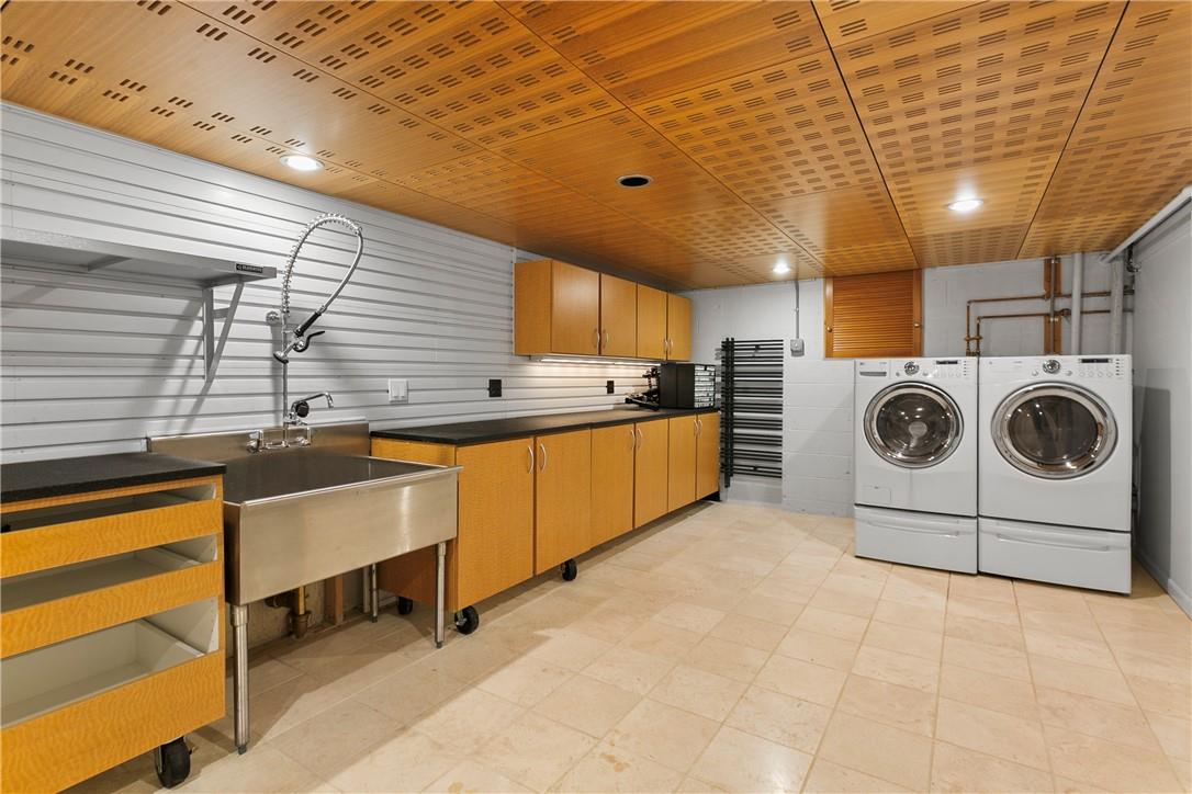177 Clinton Avenue Dobbs Ferry, NY 10522 - Photo 23 of 29 a view of a kitchen with a sink and cabinets